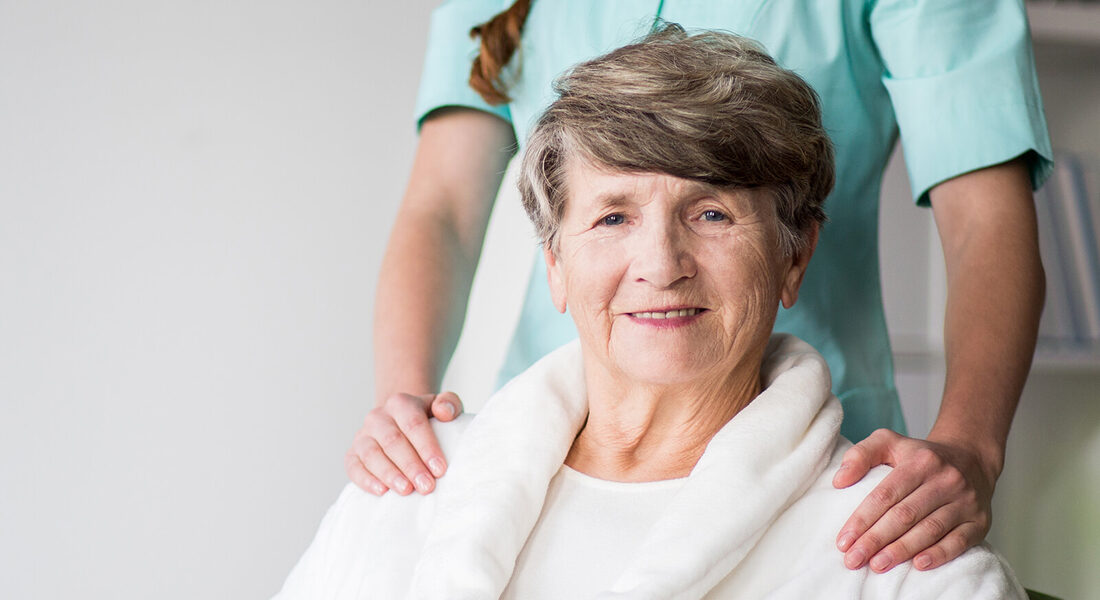 Caregiver supporting a senior